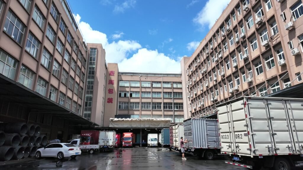Haohai factory buildings and loading yard with delivery trucks