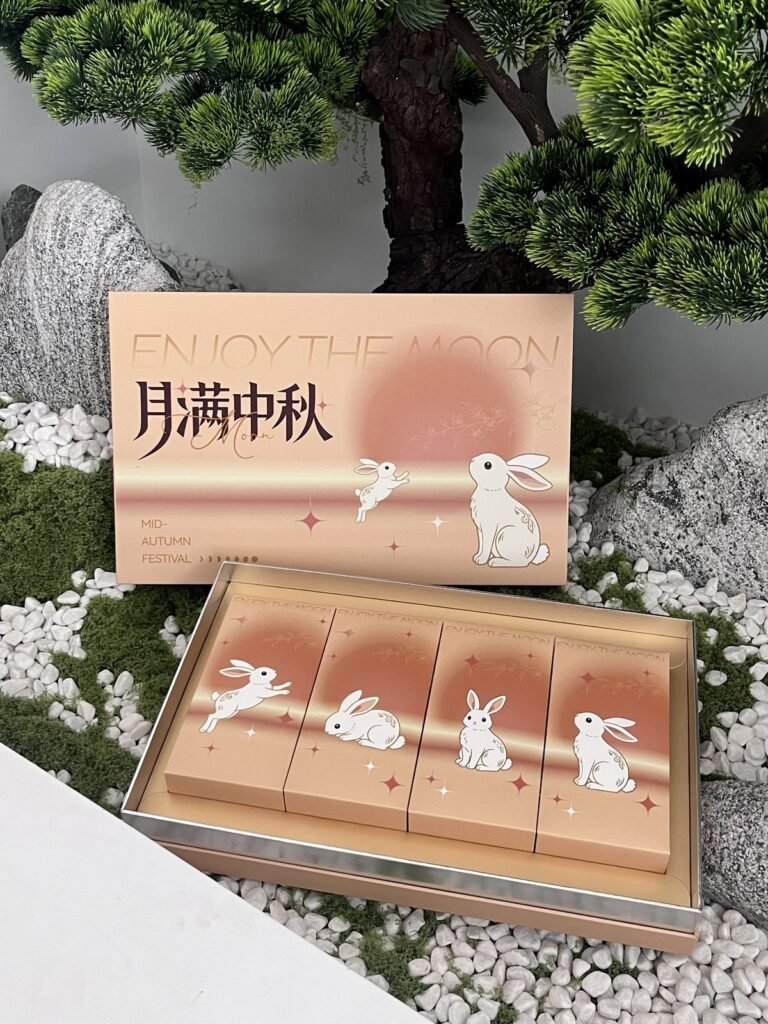 Peach lid and base gift box with four printed inner boxes