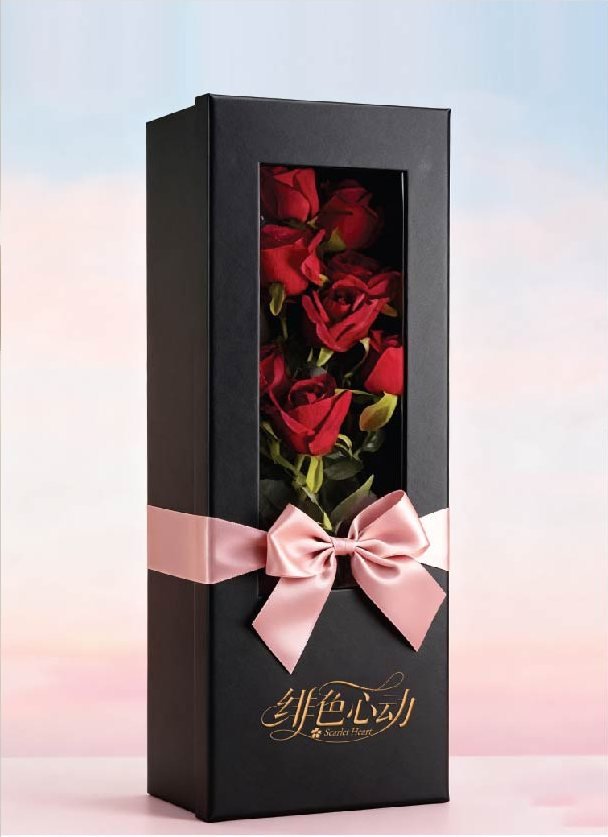 Black flower box with window and pink ribbon